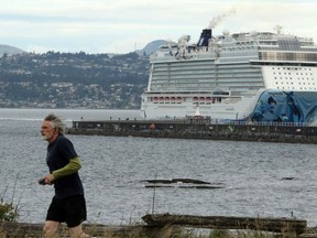 The Norwegian Bliss en route from Alaska to Seattle makes it's way towards Ogden Point in Victoria, B.C., on Friday June 1, 2018. A motion that could cap the number of cruise ships docking in Victoria's harbour has been approved by city councillors as Mayor Lisa Helps says a sustainable business case for cruise ship expansion is needed. Helps and two councillors proposed the motion which makes four recommendations, including a request to halt any increase in ship visits until the city is satisfied with cruise industry efforts to address emissions and waste issues.