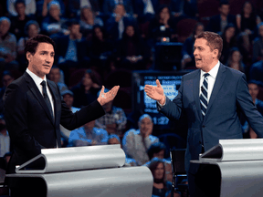 Liberal Leader Justin Trudeau and Conservative Leader Andrew Scheer during the Federal Leaders Debate in Gatineau, Quebec on Oct. 7, 2019.