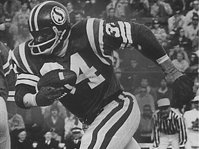 George Reed rushes for some of the 16,116 yards he gained along the ground for the Saskatchewan Roughriders.