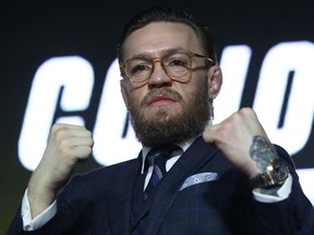 Mixed martial arts fighter Conor McGregor gestures during a news conference in Moscow, Russia, October 24, 2019.