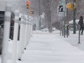 Snow covers the downtown protected bike lanes in Saskatoon, Sask., in this November 24, 2015 photo.