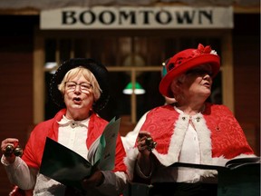 Carollers are dressed in old-time clothing at the Western Development Museum, singing Christmas carols to guests in Boomtown on December 17, 2017.