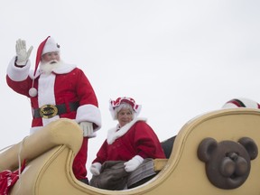 Santa Claus waves at attendees during the 28th annual Santa Claus Parade in downtown Saskatoon on Nov. 18, 2018