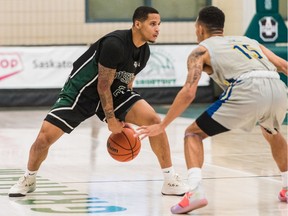 Guard J.T. Robinson, shown here in pre-season play against the Laurentian Voyageurs, is leading the U of S Huskies in scoring this season.