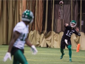 Isaac Harker, right, will start at quarterback for the Saskatchewan Roughriders on Saturday against the visiting Edmonton Eskimos if Cody Fajardo is unable to play due to a pulled muscle in his back.