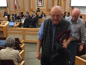 Saskatoon resident Louis Mayrand leaves Saskatoon city council chamber on Monday, Nov. 4, 2019, after stating his opposition to a proposal to eliminate posted notices about detours at bus stops. (Phil Tank/The StarPhoenix)