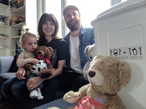 Alex Archer (left) and Tyson Schultz decided to start Pop + Tot Cloth Diaper Service to help other new parents and to keep as many disposable diapers out of the landfill as possible. (Erin Petrow/ Saskatoon StarPhoenix)
