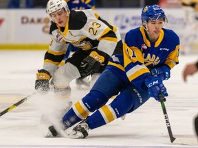 Saskatoon Blades forward Tristen Robins carries the puck against the Brandon Wheat Kings in Western Hockey League action at the Sasktel Centre on Saturday, Nov. 9, 2019 in Saskatoon.