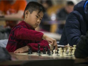 Leo Lin, age 10, plays chess during a Saskatoon Chess Club meet up at lower Place Riel on the University of Saskatchewan campus in Saskatoon, SK on Sunday, November 24, 2019. Lin is is the highest-rated player in the club.
