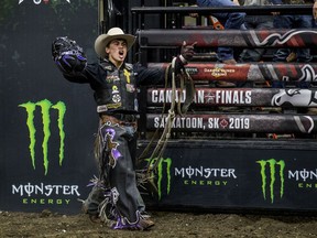 Daylon Swearingen celebrates after riding the bull Tyko Pound Sand during the PBR (Professional Bull Riders) Canadian finals at SaskTel Centre in Saskatoon, SK on Saturday, November 23, 2019. Swearingen would win the finals on his last ride of the night.