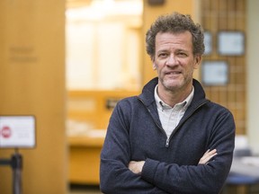 Author Yann Martel poses outside Saskatoon city council chamber after addressing council about the proposed replacement for the Francis Morrison Central Library. Council met to discuss the 2020-21 budget in Saskatoon, SK on Monday, November 25, 2019.