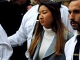 Inyoung You, a former Boston College student from South Korea, leaves court after being arraigned on involuntary manslaughter charges in connection with the suicide of her boyfriend, in Suffolk County Superior Court in Boston, Mass., Nov. 22, 2019.
