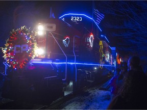 The CP Holiday Train arrives to make a stop at the 7th Avenue Railway overpass on Dec. 6, 2015.