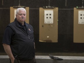 Robert Freberg, the president of the Saskatoon Wildlife Federation, demonstrates firearms safety at the SWF's indoor gun range in Saskatoon on Jan. 27, 2017.