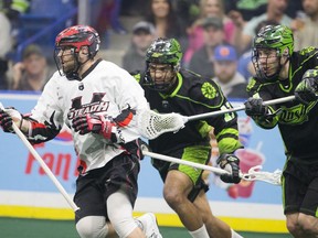 Veteran defenders Jeff Cornwall and Ryan Dilks, shown here in 2018 NLL action against Vancouver, are back with the Saskatchewan Rush after a one-year absence.