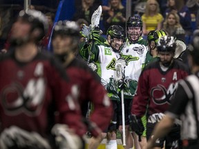 The Rush celebrate a goal against Colorado during a game last season.