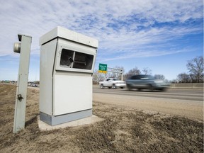 Vehicles drive past a photo speed enforcement camera in Saskatoon, SK on Monday, March 25, 2019.