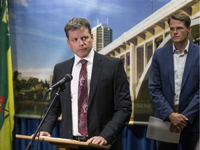 Saskatoon city manager Jeff Jorgenson, left, and Mayor Charlie Clark speak to reporters in August 2019.