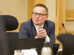 Coun. Darren Hill listens to a presentation at a November 2019 city council meeting.