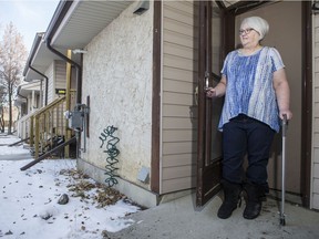 Marie Work, resident at the Rainbow Housing Cooperative, at the front door of her home in Saskatoon, SK on Friday, December 6, 2019.