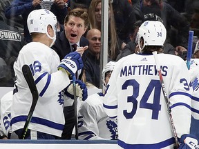 Mike Babcock of the Maple Leafs handles the bench during the third period against the New York Islanders at NYCB Live's Nassau Coliseum on November 13, 2019 in Uniondale, N.Y. (Bruce Bennett/Getty Images)
