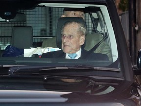Britain's Prince Philip leaves the King Edward VII's Hospital in London, Tuesday, Dec. 24, 2019.