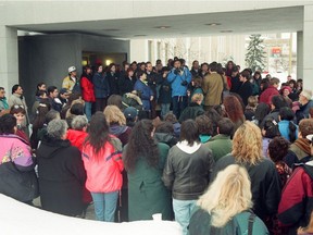 REGINA, SASK : January 30, 1997 — A crowd of some 300 people, including those from Aboriginal, anti-racism and women's groups, gathered in front of Regina Court of Queen's Bench to hold a vigil before the sentencing of Alexander Ternowetsky and Steven Kummerfield, who were convicted of manslaughter in the death of Pamela George. Speaking at the centre of the crowd in blue is elder Mike Pinay. DON HEALY / Regina Leader-Post