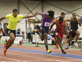 Bryce Robinson, left to right, Sean McLean, D'Angelo Cherry, Blake Smith and Ryan Billian cross the finish line in the Men's invitational 50-meter dash final during the Knights of Columbus Games at the Field House in Saskatoon on Friday, January 25, 2019.