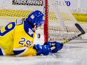 Saskatoon Blades defencemen Majid Kaddoura watches helplessly as the puck crosses the goal-line into the Blades net during New Year's Day hockey action at the Sasktel Centre on Wednesday, Jan. 1, 2020 in Saskatoon. Final Score: Saskatoon 1, Winnipeg 6.