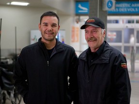 Saskatchewan Public Safety Agency wildlands firefighters Phane Ray (left) and Kevin Buettner (right) return to the airport in Saskatoon on Jan. 9, 2019 after 38 days of fighting fires in Australia. Ray and Buettner were part of the first Canadian deployment sent to Australia in December.