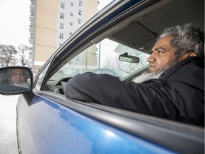 Muhammad Tariq, an immigrant from Pakistan and a former Saskatoon cab driver, who has been driving full-time for Uber since May, poses in his Uber car at the Star Phoenix parking lot in Saskatoon, SK on Thursday, January 16, 2020.