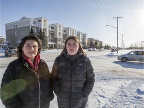 Calli Zapisocki, right, was struck by a vehicle while crossing the intersection in October. Her mother Shelley Zapisocki, left, wants traffic lights at the busy intersection near a high school, but there's nothing in the budget for the next two years. Photo taken in Saskatoon on Jan. 18, 2020.