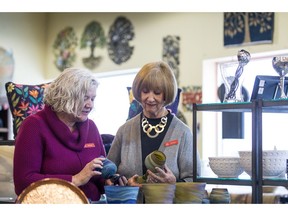 Carol Reimer-Wiebe and Monica Dalke, at Ten Thousand Villages in Saskatoon. MCC Saskatchewan has announced it will be shutting down the Ten Thousand Villages retail stores across Canada. (Matt Smith / Saskatoon StarPhoenix)