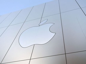 In this file photo taken on Sept. 22, 2017 an Apple logo is seen on the outside of an Apple store in San Francisco.