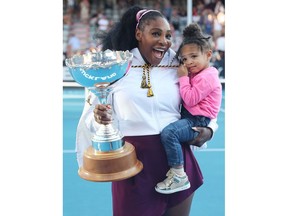 Serena Williams of the US with her daughter Alexis Olympia after her win against Jessica Pegula of the US during their women's singles final match during the Auckland Classic tennis tournament in Auckland on January 12, 2020. (Photo by MICHAEL BRADLEY / AFP)
