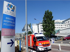 (FILES) This file photograph taken on August 1, 2013, shows a general view of the CHU hospital Pellegrin in Bordeaux, south-western France. - A patient "suspected of coronavirus" was hospitalized January 23, 2020, in Bordeaux and is under "observation", SOS Doctors announced January 24, on social networks. SOS Médecins Bordeaux announced on Facebook that it had "taken care of a patient suspected of coronavirus 2019-nCov", presenting with "fever and cough", initially for what appears to be a "classic" consultation.