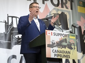 Premier Scott Moe speaks at Evraz Place in Regina during a rally protesting the Trudeau carbon tax, Bill C-69, Bill C-48, and advocating for pipelines.