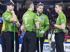 Skip Kirk Muyres speaks with third Kevin Marsh, lead Dallan Muyres and second Daniel Marsh during the 2019 Brier.