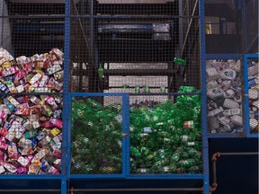 Recyclables are sorted into bins at the SARCAN processing plant on Fleury Street in Regina.