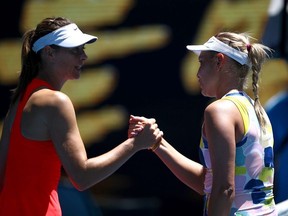 Croatia's Donna Vekic shakes hands with Russia's Maria Sharapova after winning the match.