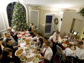 A large group gathers to mark Ukranian Christmas at the home of James and Marsha Hrycuik.