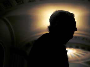 Senate Majority Leader Mitch McConnell walks to his office from the Senate Chamber during a break in the opening arguments of the impeachment trial on Capitol Hill in Washington, U.S., January 21, 2020.