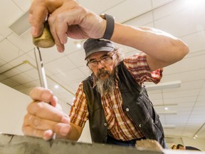 Indigenous Artist in Residence Lyndon Tootoosis is hand-carving the 13 moons of the lunar calendar into 13 stairs removed from a historic building on the U of S campus.