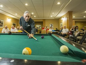 Alan Crawford downs a ball in the billiards competition at the All Seniors Games at Preston Park Living on Feb. 5, 2020 (Matt Smith / Saskatoon StarPhoenix)