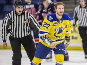 Saskatoon Blades defenceman Nolan Kneen, shown here after a recent fight, has hit the 300-game milestone in the WHL.