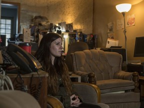 Krista Kut sits in her mother and father's house just days after her mom suddenly died on Tuesday evening. (Saskatoon StarPhoenix/Liam Richards