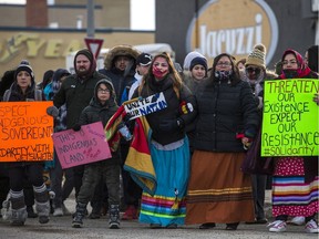 Protestors disrupt traffic at the intersection of 22nd Street West and Idylwyld Drive in Saskatoon, SK on Thursday, February 13, 2020. The protest was one of many Wet'suwet'en solidarity blockades taking place in recent days across the country.