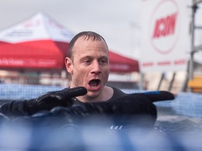 Tyler McMurchy of SGI reacts to the cold water after taking a dip Monday at the Law Enforcement Torch Run Polar Plunge, a fundraiser for Special Olympics Saskatchewan.