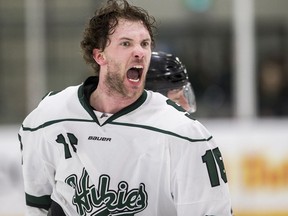 University of Saskatchewan Huskies forward Carson Stadnyk expresses his feelings to the officials and the University of Calgary Dinos during Canada West semifinal Game 1 action at Merlis Belsher Place on the U of S campus in Saskatoon on Friday, February 21, 2020.