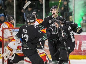 The University of Saskatchewan Huskies celebrate a goal against the University of Calgary Dinos in Game 2 of their best-of-three Canada West men's hockey semifinal at Merlis Belsher Place on the U of S campus in Saskatoon on Saturday, February 22, 2020. The Huskies defeated the Dinos 5-4 in double OT to sweep the series.